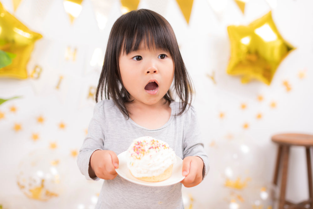 A child celebrating their birthday.
