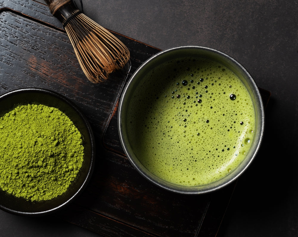 Traditional Matcha Drink with Whisker and Matcha Powder