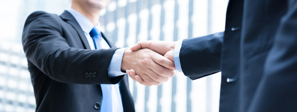 Japanese business etiquette hand shake of agreement
