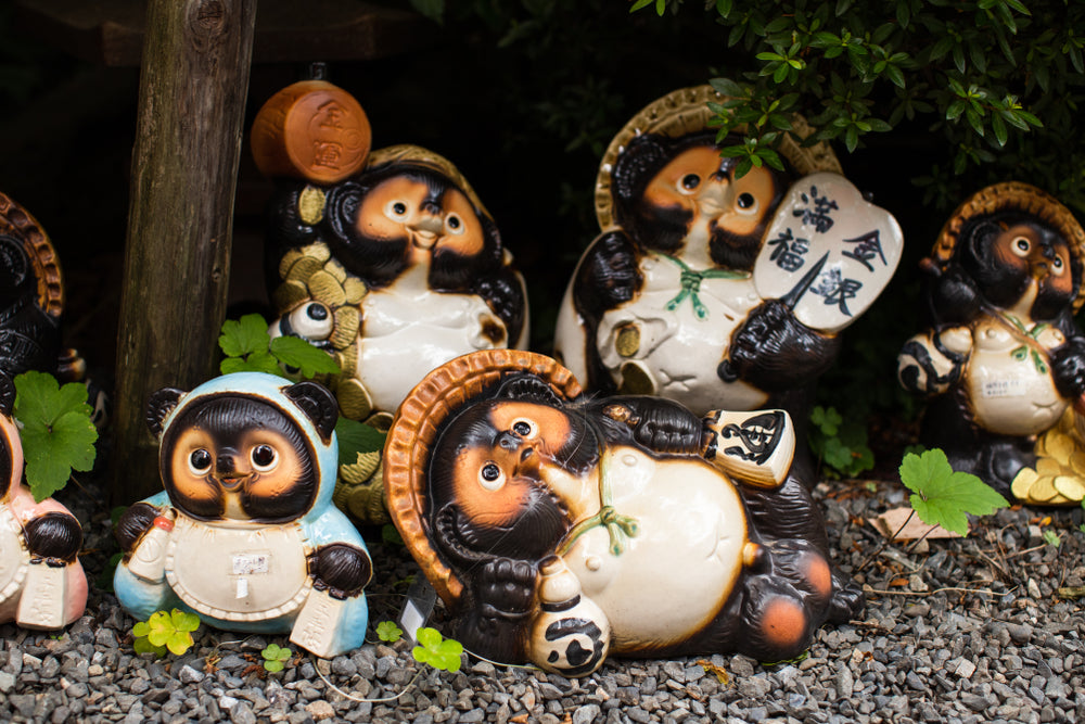 Japanese Tanuki statue in a traditional garden 
